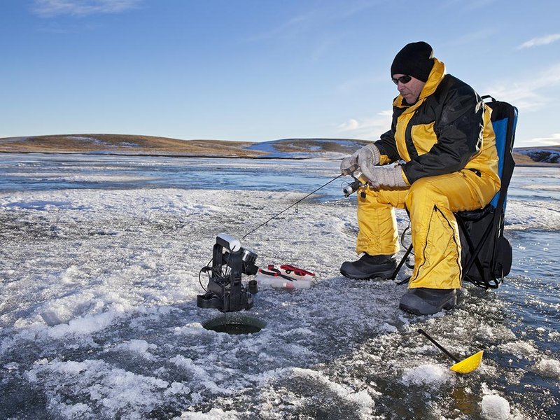 Experience the Thrill of Ice Fishing in a Canadian Winter Wonderland in Canada Experience the Thrill of Ice Fishing in a Canadian Winter Wonderland in Canada